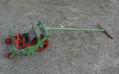 Parkinson Villa mower with unusual cast iron T handle.