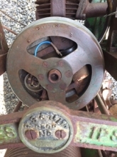 Flywheel with number (upside down)and mower number plate